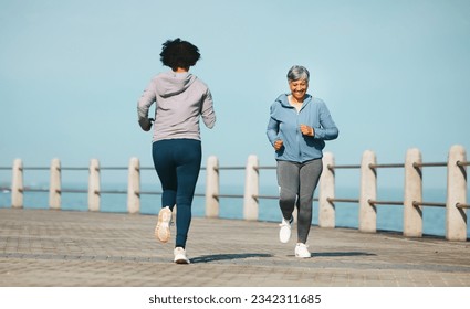 Running, fitness and senior friends by sea with mature women and smile from marathon. Exercise, workout and training on beach promenade path for health and wellness in the morning with happy people - Powered by Shutterstock