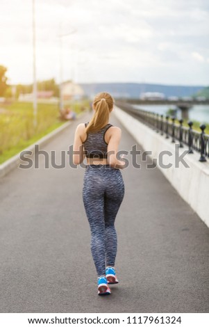 Similar – Attractive fit man running at sunset light