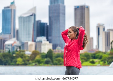 Running Healthy Lifestyle In Sydney City Runner Asian Woman Preparing Her Hair To Run Morning Exercise.