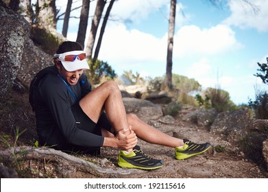 Running Injury For Trail Runner On Mountain Twisted Ankle