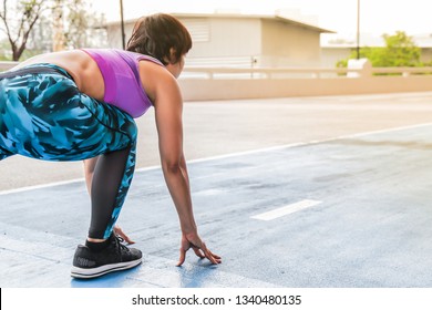 Running And Moving Forward To The Finish Line Concept, Showing A Strong And Ambitious Female Runner Who Is Ready To Run And Try To Move Forward For A Better Outcome Or Future