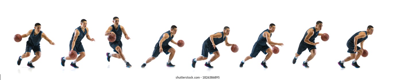 Running on. Young basketball player of team training in action, motion in jump of step-to-step goal isolated on white background. Concept of sport, movement, energy and dynamic, healthy lifestyle. - Powered by Shutterstock