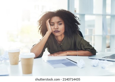 Running Out Of Ideas Is Normal, Just Never Give Up. Portrait Of A Young Businesswoman Sitting At Her Office Desk Looking Tired And Stressed Out.