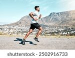 Running, outdoor and man with energy, nature and fitness of athlete, exercise and routine for race. Challenge, practice and preparing for speed of marathon, training or performance of runner in space