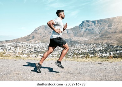 Running, outdoor and man with energy, nature and fitness of athlete, exercise and routine for race. Challenge, practice and preparing for speed of marathon, training or performance of runner in space - Powered by Shutterstock