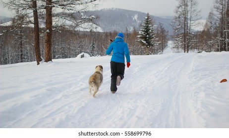 Running and playing with the animals
