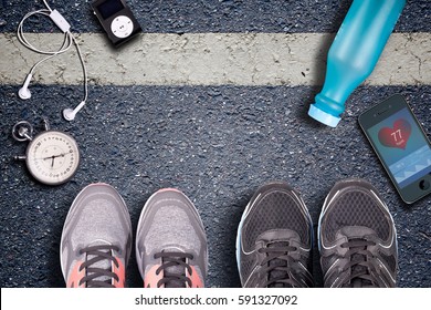 Running Shoes And Stopwatch. Hart Rate Monitor And Smartphone Whit Pulse. Ready To Run. Running On Asphalt. Control Your Pulse Whit Heart Rate Monitor.