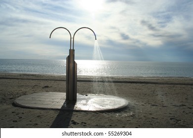 Running Shower On The Beach, Spain