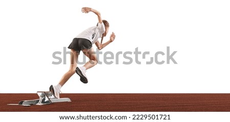 Running technique. Back view of beginner female track runner bursting off starting block isolated on white background. Concept of sport, workout, skills and achievements. Little girl training