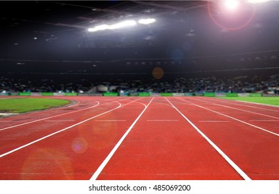 Running Track Inside A Stadium At Night