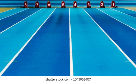 Running tracks in an empty stadium.