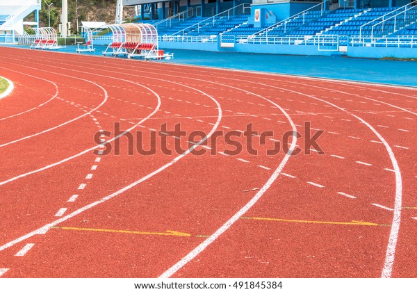 Running tracks in an empty
stadium.