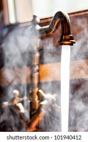 Running Vintage Faucet With Hot Water. Close-up View