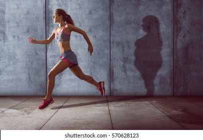 Running Woman With A Fat Shadow