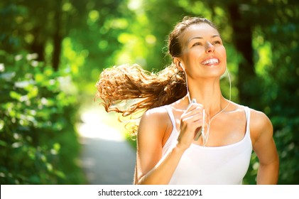 Running Woman. Female Runner Jogging During Outdoor Workout In A Park. 