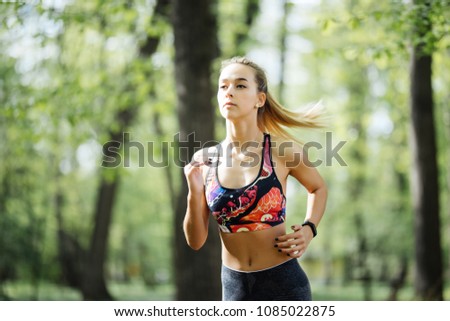 Similar – Slim figure shapely woman in sportswear