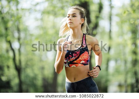 Similar – Slim figure shapely woman in sportswear