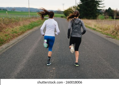 Running Women Jogging In Country