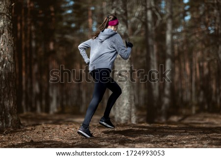 Similar – Image, Stock Photo Young man exercising outdoors in a forest