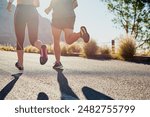 Running, workout and friends or people in nature for exercise, warm up and marathon training together. Woman, man or sports coach back in mountains, trail or wellness fitness support or challenge