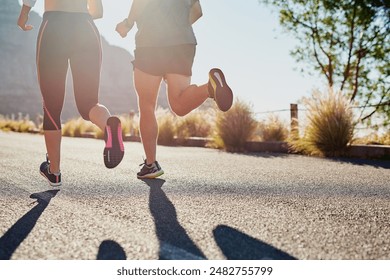 Running, workout and friends or people in nature for exercise, warm up and marathon training together. Woman, man or sports coach back in mountains, trail or wellness fitness support or challenge - Powered by Shutterstock