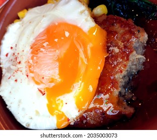 Runny Egg Yolk On A Juicy Hamburg