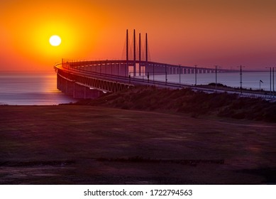 Öresundsbron Runs Between Sweden And Denmark, Here Photographed At Sunset.