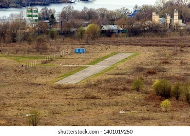 Runway In The Field. Tushino Airfield, Moscow, Russia. Abandoned Airport. Aerial View Of A Runway At Sunset. Airport Airstrip, Runway