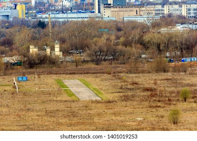 Runway In The Field. Tushino Airfield, Moscow, Russia. Abandoned Airport. Aerial View Of A Runway At Sunset. Airport Airstrip, Runway