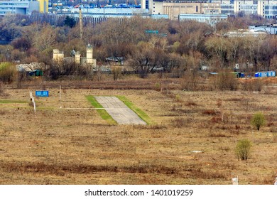 Runway In The Field. Tushino Airfield, Moscow, Russia. Abandoned Airport. Aerial View Of A Runway At Sunset. Airport Airstrip, Runway