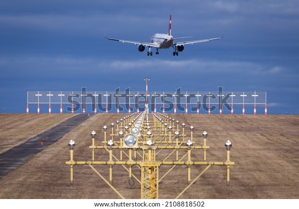 runway\
lights with landing airbus in vienna in\
austria