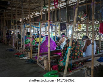 Rupganj, Dhaka Division, Narayanganj District, Bangladesh - 6th March, 2017. Handloom Weavers Creating World Famous Dhakai Jamdani Muslin Sarees Using Cotton And Gold Threads.