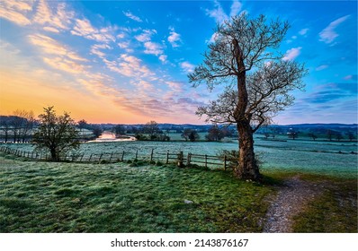 Rural area in the early morning at dawn. Nature in early morning at dawn. Rural country nature at dawn. Beautiful sunrise in countryside at dawn - Shutterstock ID 2143876167