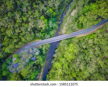 Rural Bridge Above River Amongst The Bush Aerial