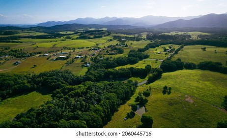 Rural country landscape featuring forests, ponds, open fields, mountains and farmland. Julatten, Far North Queensland Australia