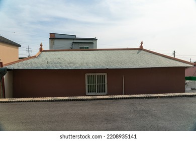 Rural Farmhouse Houses In Korea And Colored Roofs.