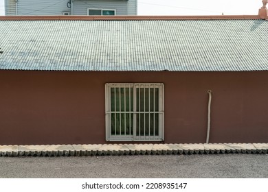 Rural Farmhouse Houses In Korea And Colored Roofs.