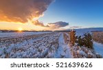rural field with cut grass, a haystack and the first snow, Russia, Ural autumn