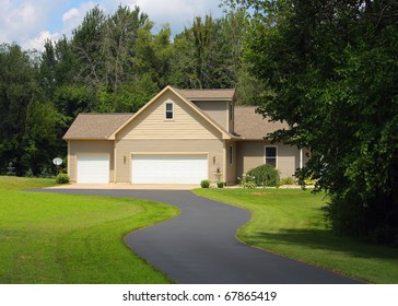 A Rural Home At The End Of A Driveway.