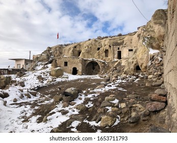 A rural house in a poor village in the Turkish region of Cappadocia. Settlement in a historic area among volcanic mountains and underground cities. - Shutterstock ID 1653711793