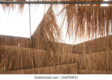 Rural house roof made of cogon grass,thatch roof background,Basketwork,Straw pattern roof background and texture - Shutterstock ID 2160704911
