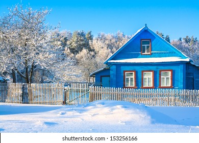  rural house in the winter covered with snow