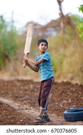 657 Indian child playing cricket Images, Stock Photos & Vectors ...