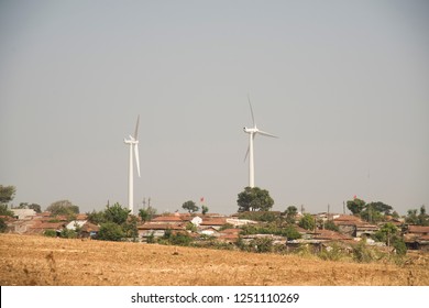 Rural Indian Village with Windmills.