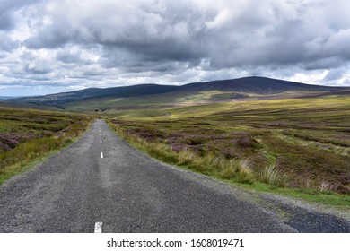 Rural Irish Country Road Through Mountains