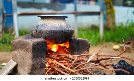 Rural kitchen. Traditional stoves used by residents in rural India, made of clay, fueled with wood - Shutterstock ID 2030582999