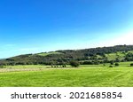 Rural landscape, with dry stone walls, fields, and distant hills in, Summerbridge, Harrogate, UK