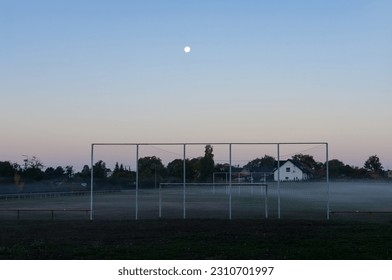 Rural Landscape: Early Morning Mist over a Soccer Field - Powered by Shutterstock