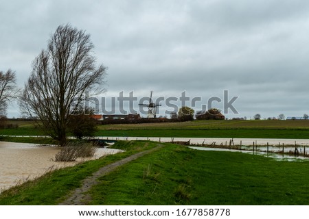 Rural landscape in West Flanders, Belgium near Beveringe and Stavele with flood of the river IJzer Stock photo © 