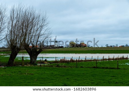 Rural landscape in West Flanders, Belgium near Beveringe and Stavele with flood of the river IJzer Stock photo © 